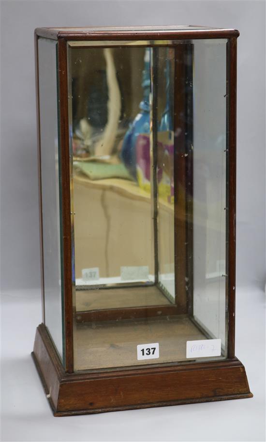 A mahogany shop display cabinet